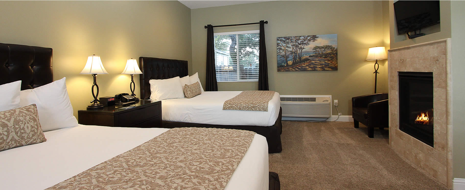 monterey ca lodging - two beds, fireplace and TV