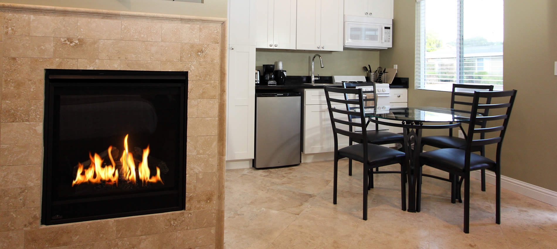 fireplace and kitchen at monterey peninsula hotel